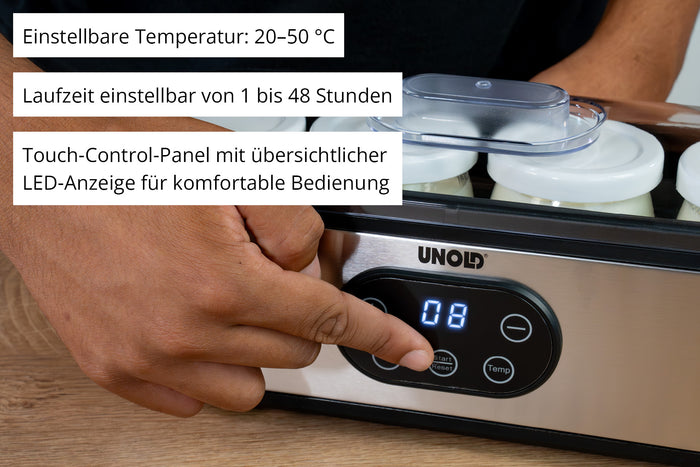 Am Unold Joghurtbereiter JOGI aus Edelstahl, der รผber ein LED-Touch-Bedienfeld verfรผgt, lรคsst sich die Temperatur per Hand einstellen. Der Text hebt die einstellbare Temperatur, die Timer-Funktion und die benutzerfreundlichen Bedienelemente hervor.