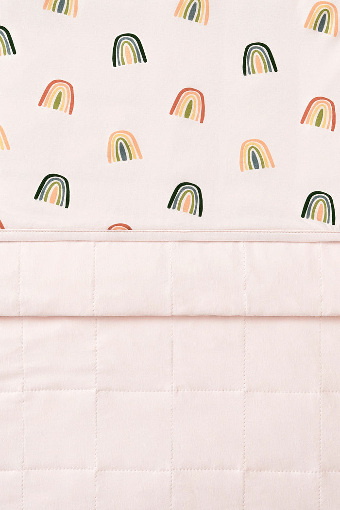 Front and Back of Vanilla cream Toddler Blanket in Retro Rainbow 1.0 print