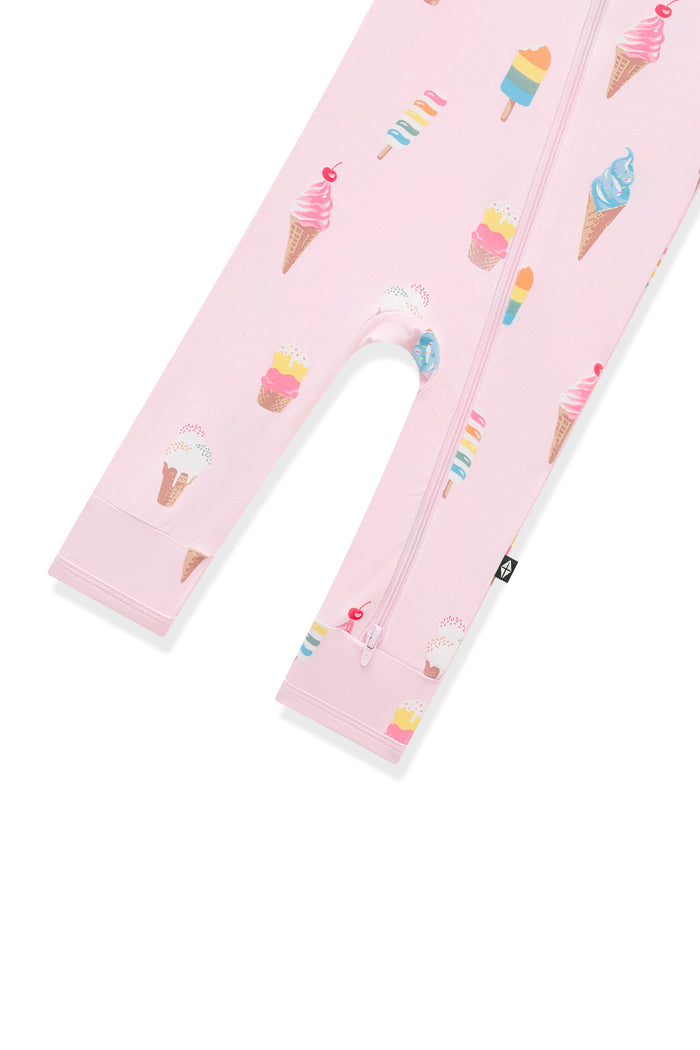 Bottom part of pink Zippered Romper in Ice Cream print on white background