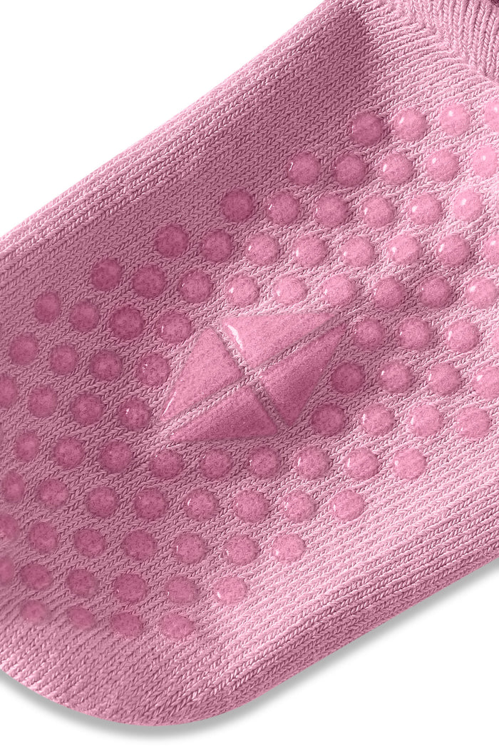Close up of Ankle Socks with grips in apple blossom shown on a white background