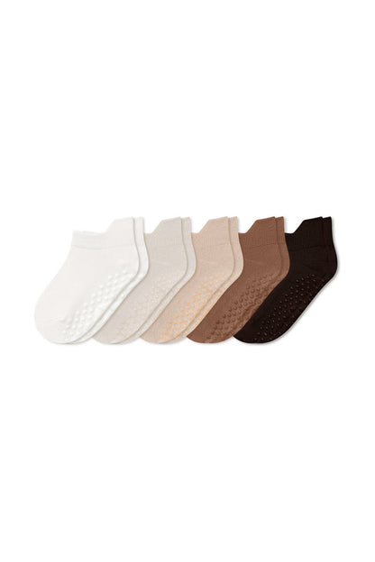 A set of five low-cut ankle socks in various shades of white, beige, tan, brown, and dark brown, arranged in a fan shape against a plain white background.