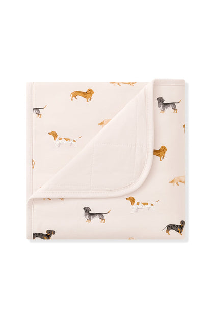 Beige Baby Blanket with Dachshund print on a white background