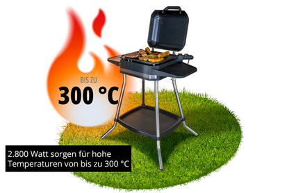 Der Unold BBQ-Stand-/Tischgrill Jimmy gart Fleisch und Gemüse auf einer Rasenfläche und erreicht dabei mit kraftvollen 2.800 Watt bis zu 300°C – perfekt zum Hochtemperaturgrillen.