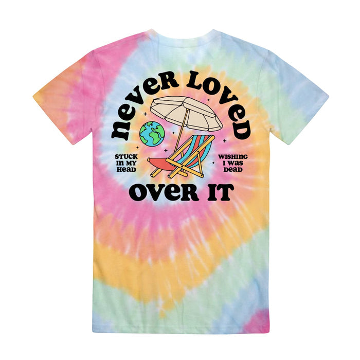 Back of multi-colored tie dye short sleeve. Beach chair and umbrella design in the center, with  globe drawn in to the upper left. NEVER LOVED written above the beach chair, and OVER IT written below. To the left there is text that says STUCK IN MY HEAD, and to the right there is text that says WISHING I WAS DEAD.