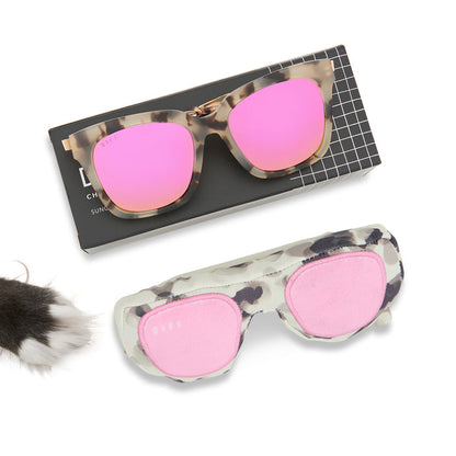 diff eyewear pup box side by side of bella cream tortoise with pink lenses and pup box toy