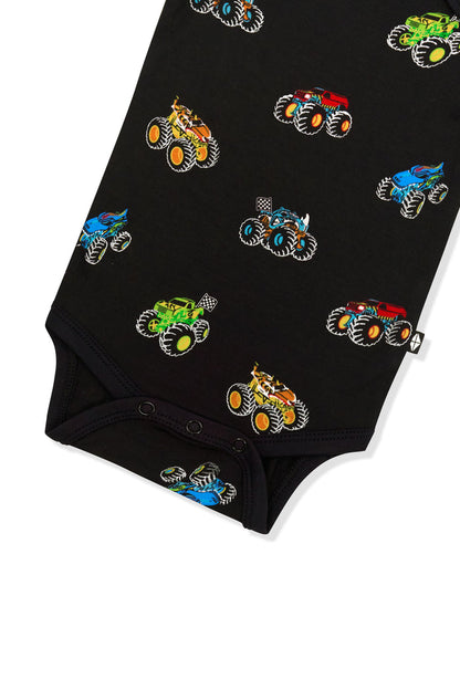 Snap buttons at the bottom of Bodysuit in Monster Truck print on white background