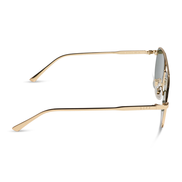 diff eyewear charley navigator sunglasses with a gold metal frame and dew drop blue mirrored lenses side view