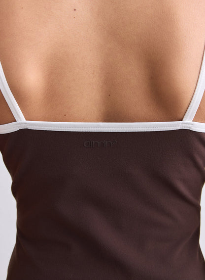 Back view of a chocolate brown Sense Contour Singlet with white straps and a small aim'n logo. [S-165cm]