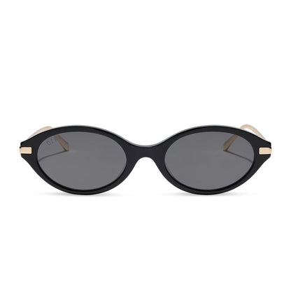 diff eyewear claudine oval sunglasses with a black acetate frame, gold metal temples and grey polarized lenses front view