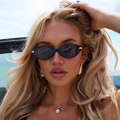 lifestyle - ashley smith wearing black oval sunglasses