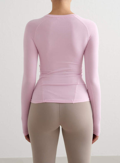Cotton Candy pink aim'n Soft Basic Long Sleeve with raglan sleeves and a second skin fit, back view.