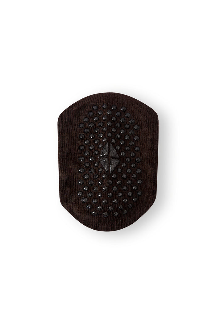 A dark brown textured sock with a central diamond-shaped metallic accent, shown against a plain white background.