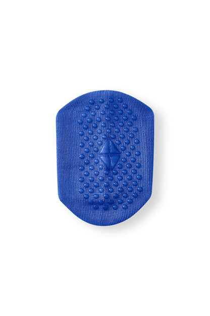 A blue textured silicone massage pad with a diamond-shaped center, shown on a plain white background.