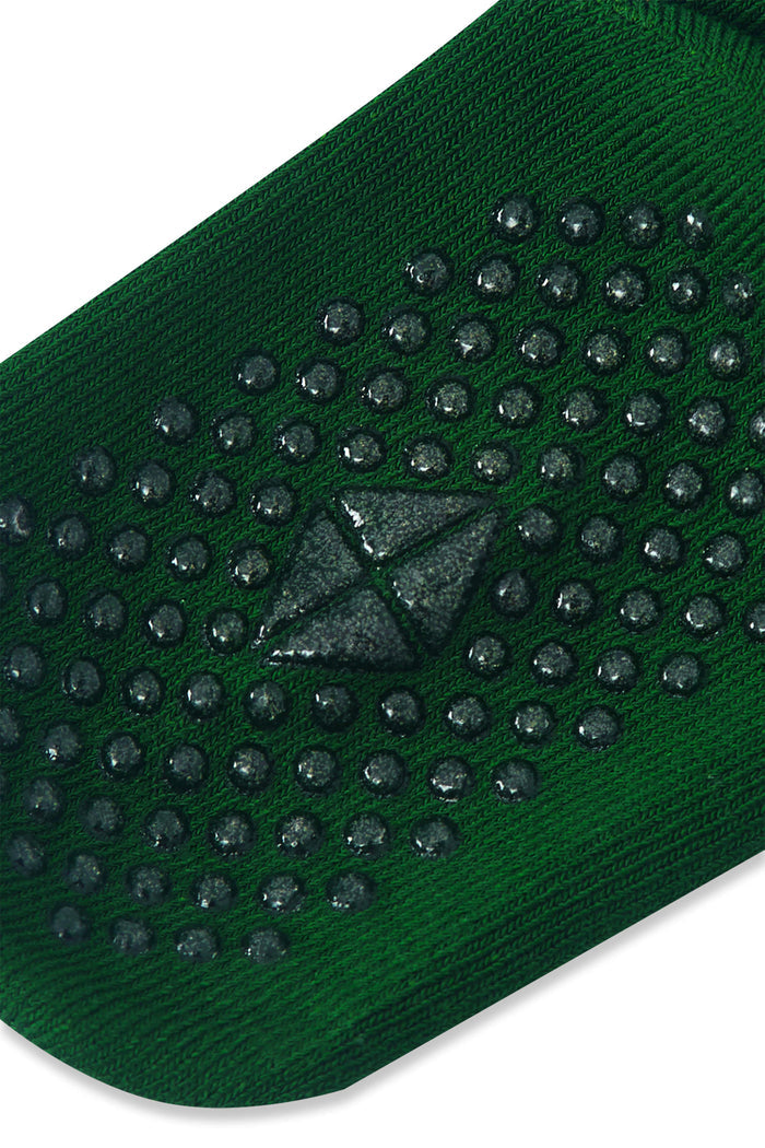 Close up of textured grip green sock