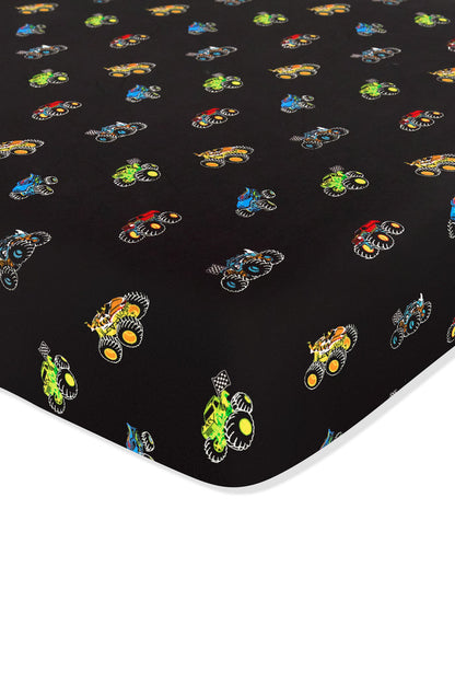 Crib Sheet with colorful Monster Truck print on white background