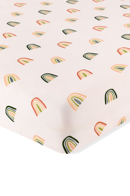 Vanilla cream Crib Sheet in Retro Rainbow print on a white background