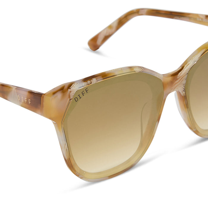 diff eyewear gia oversized square sunglasses with a gilded tortoise acetate frame and brown gradient with light gold flash lenses detailed view
