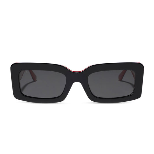 diff eyewear featuring the indy rectangle sunglasses with a black, white & red frame and grey polarized lenses front view