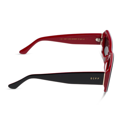 diff eyewear featuring the indy rectangle sunglasses with a black, white & red frame and grey polarized lenses side view