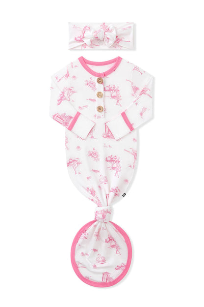 Knotted Gown with Bow Set in Toile Ballet folded with the arms inward on a white background