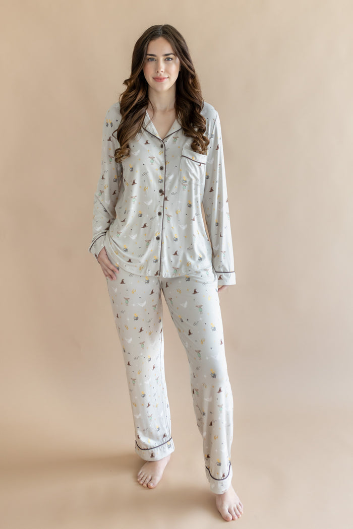 Model wearing a cream Long-Sleeved Women's Pajama Set with Harry Potter prints on a beige background