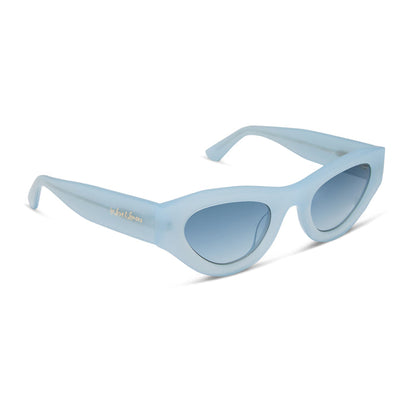 for love & lemons diff eyewear featuring the lucy cat eye sunglasses with a pastel blue acetate frame and blue gradient polarized lenses angled view