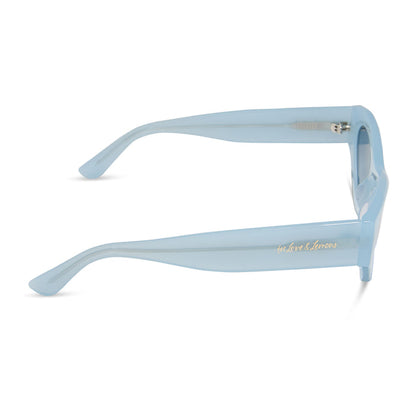 for love & lemons diff eyewear featuring the lucy cat eye sunglasses with a pastel blue acetate frame and blue gradient polarized lenses side view
