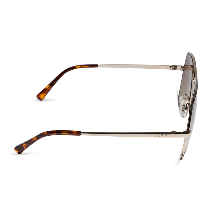 diff eyewear maude oversized aviator sunglasses with a gold metal frame and brown gradient polarized lenses side view