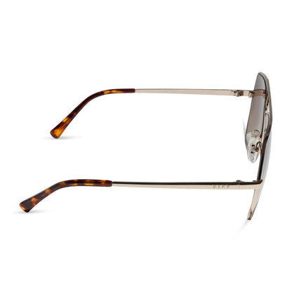 diff eyewear maude oversized aviator sunglasses with a gold metal frame and brown gradient polarized lenses side view
