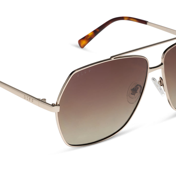 diff eyewear maude oversized aviator sunglasses with a gold metal frame and brown gradient polarized lenses detailed view