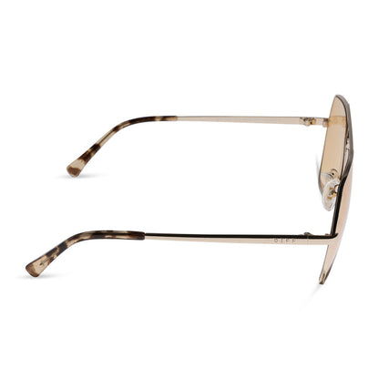 diff eyewear maude oversized aviator sunglasses with a gold metal frame and champagne yellow tint lenses side view