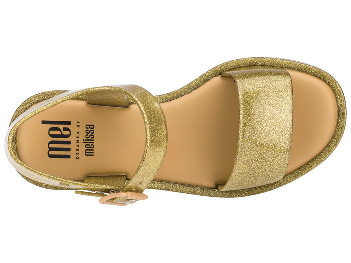 Golden glitter buckle sandals for girls, stylish and comfortable footwear perfect for parties and casual outings.