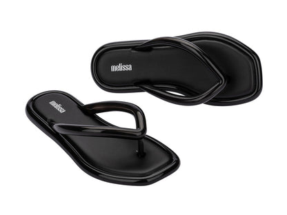 Melissa Airbubble AD Black Thong Flip-Flops for Women – Stylish and comfortable casual footwear.