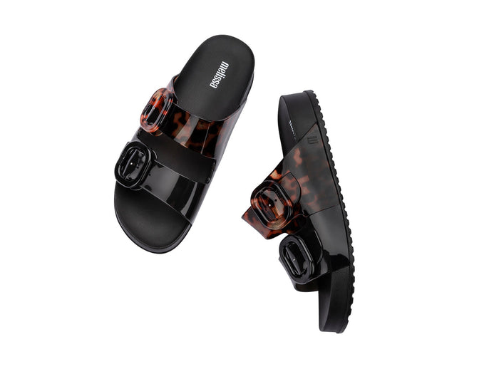 Melissa Cozy Black Slide Sandals for Women with Tortoise Printed Buckle Strap – Trendy and Comfortable Footwear