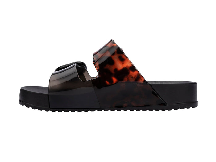Melissa Cozy Black Slide Sandals for Women with Tortoise Printed Buckle Strap – Trendy and Comfortable Footwear