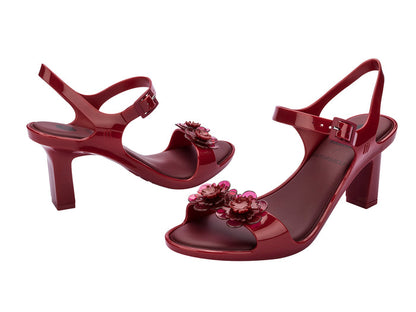 Melissa Lady Emme Blossom Viktor & Rolf Floral Red Heel Sandal for Women – Elegant high-heeled sandal with floral embellishments, perfect for stylish occasions.