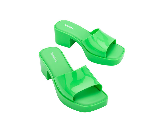 Melissa Shape AD Green Block Heel Slides for Women – Stylish and comfortable slip-on sandals with a trendy block heel, perfect for adding a touch of elegance to any outfit.