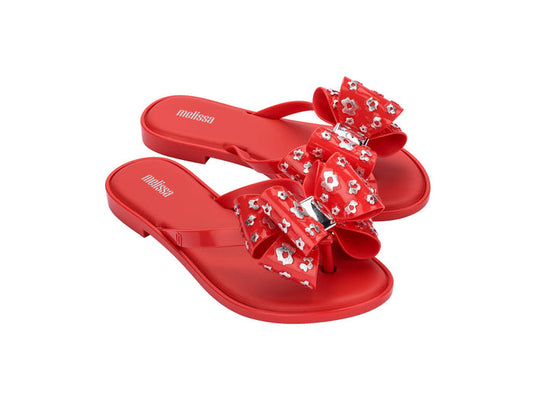 Melissa Slim III Women Red Flat Flip Flops with Oversized Bow – Stylish and comfortable red flip-flops featuring a chic oversized bow for a trendy and feminine look.