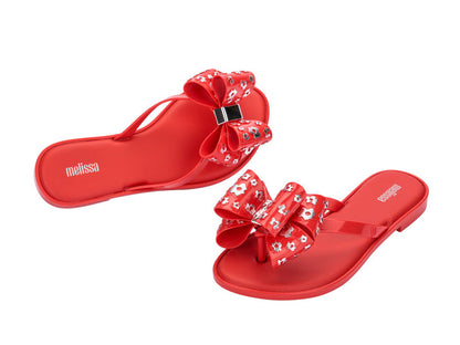 Melissa Slim III Women Red Flat Flip Flops with Oversized Bow – Stylish and comfortable red flip-flops featuring a chic oversized bow for a trendy and feminine look.
