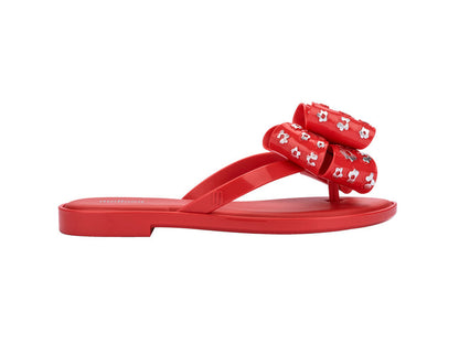 Melissa Slim III Women Red Flat Flip Flops with Oversized Bow – Stylish and comfortable red flip-flops featuring a chic oversized bow for a trendy and feminine look.