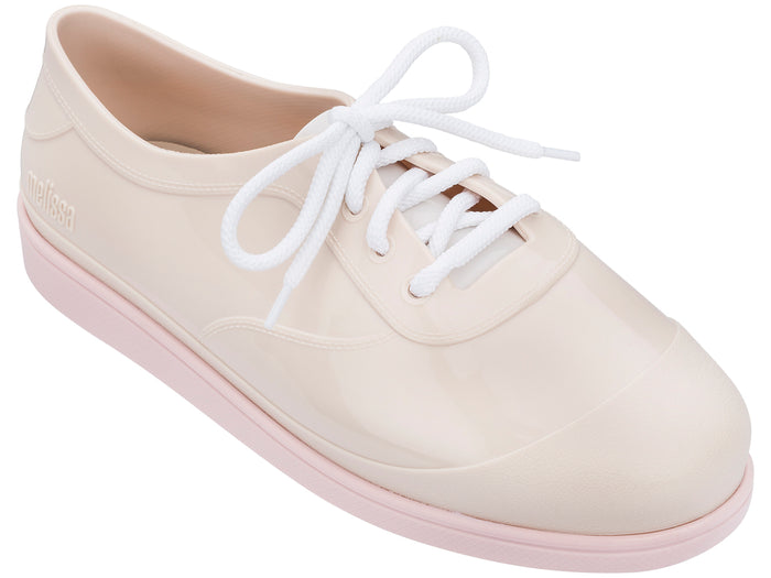 Melissa Line solid beige unisex lace-up sneakers with a sleek design and comfortable fit for versatile everyday wear