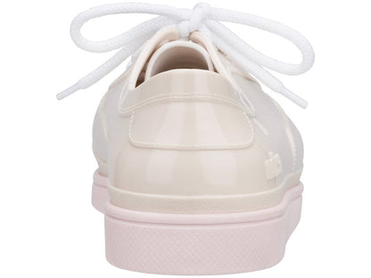 Melissa Line solid beige unisex lace-up sneakers with a sleek design and comfortable fit for versatile everyday wear