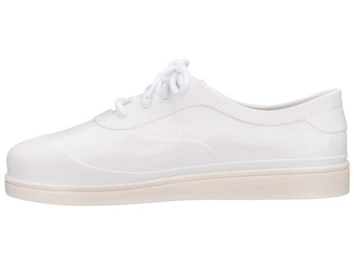 Melissa Line solid white unisex lace-up sneakers with a sleek design and comfortable fit for versatile everyday wear