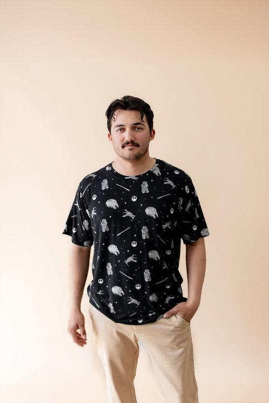Male modeling the Men's Crew Neck Tee in STAR WARS™ paired with tan pants