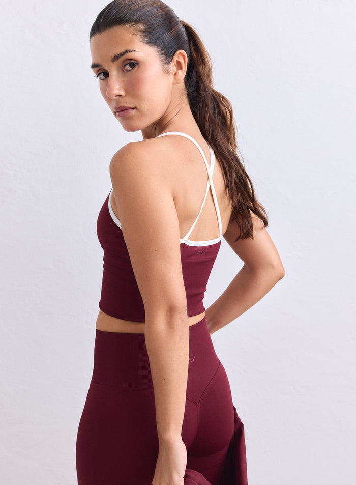 Merlot Shape Seamless Cross Back Bralette with white straps and ribbed details by aim'n. [XS-165cm]