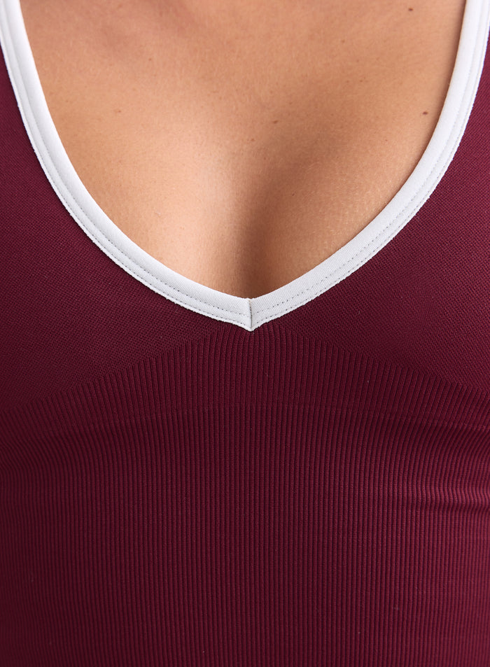 Merlot Shape Seamless bralette with white V-neck trim and ribbed texture by aim'n [XS-165cm]