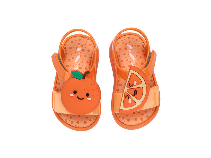 Mini Melissa Jump Fruitland Yellow Sandal with Orange Design for Babies – Adorable and comfortable baby sandals featuring a fun fruit-inspired design, perfect for everyday wear.