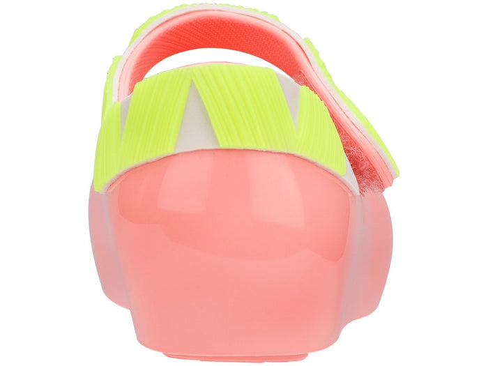 Mini Melissa Ultragirl Alpaca Me baby sandals in pink and yellow with a cushioned sole, designed for comfortable first steps and playful toddler footwear