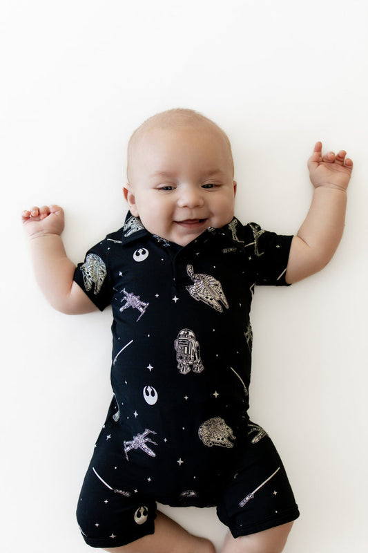 Close up of infant wearing the Polo Shortall in STAR WARS™