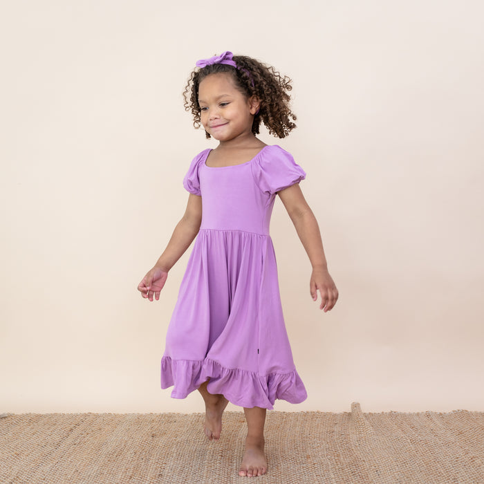 Toddler modeling Puff Sleeve Twirl Dress in Poi